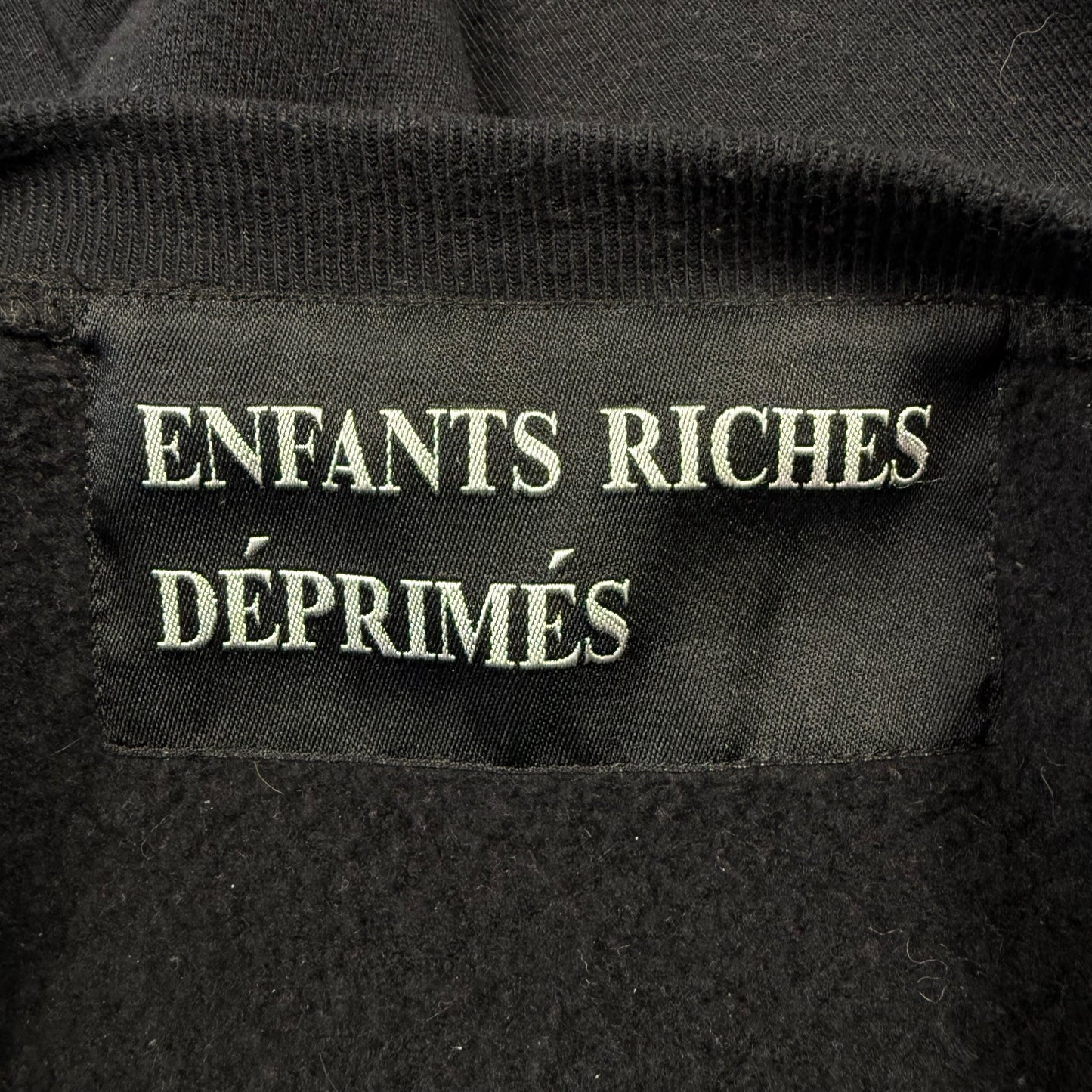 ENFANTS RICHES DÉPRIMÉS LOOSE THREAD SWEATER