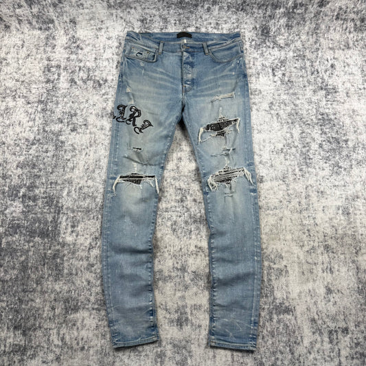 Amiri Old English Logo ‘Clay/Indigo’ Jeans