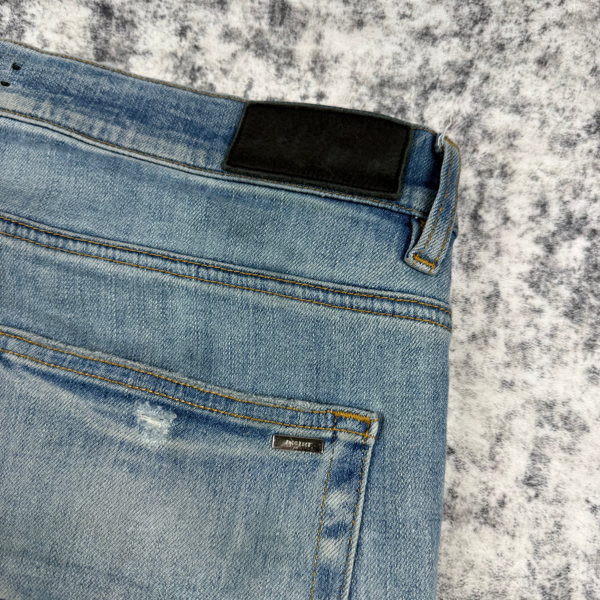 Amiri Old English Logo ‘Clay/Indigo’ Jeans