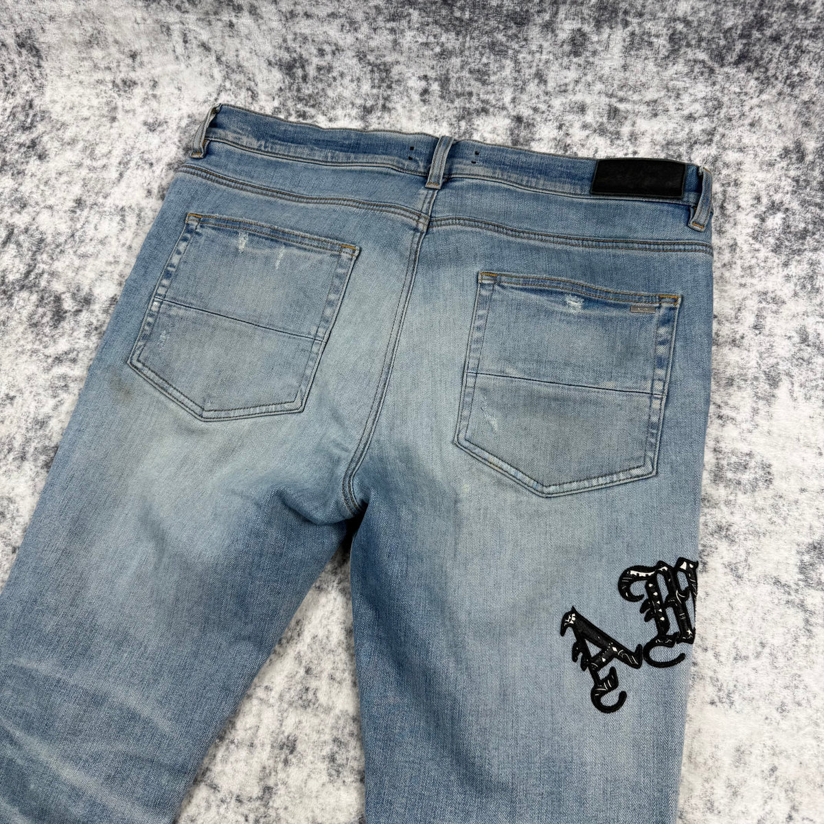 Amiri Old English Logo ‘Clay/Indigo’ Jeans
