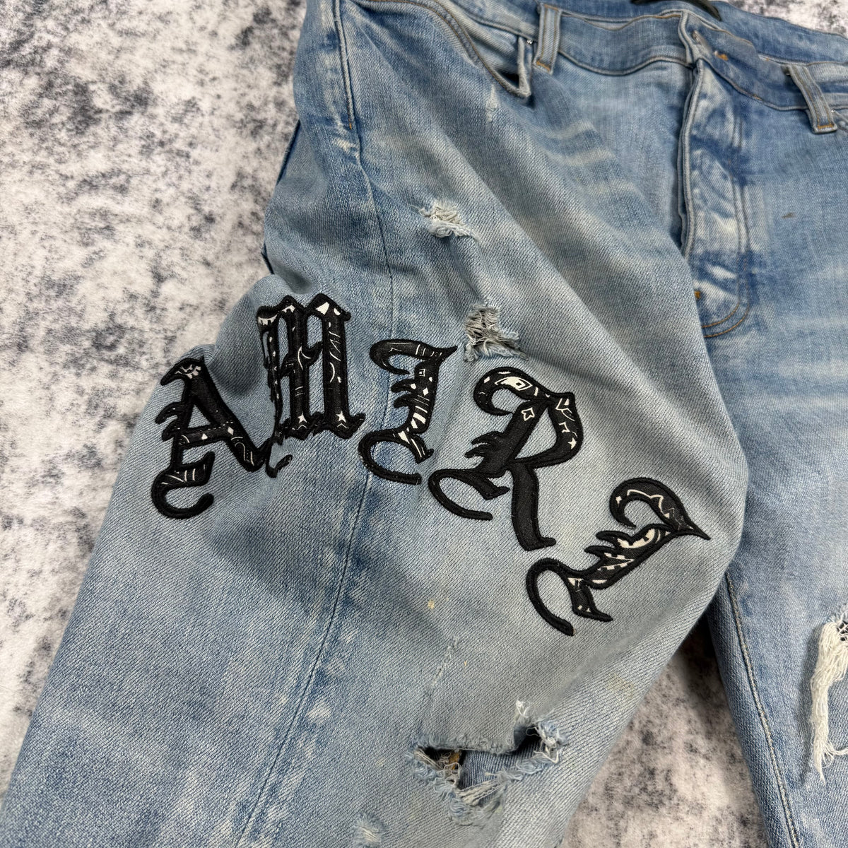 Amiri Old English Logo ‘Clay/Indigo’ Jeans