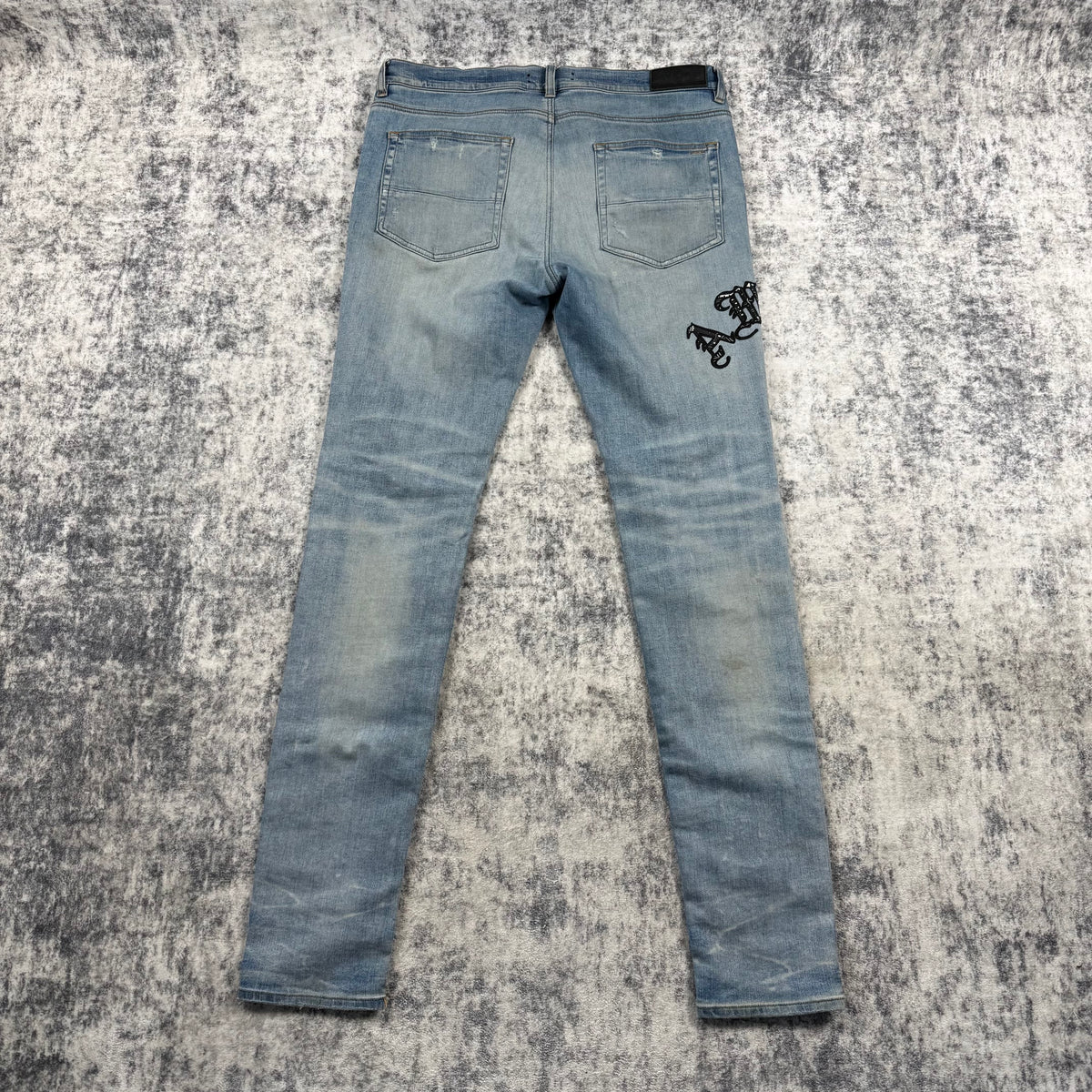 Amiri Old English Logo ‘Clay/Indigo’ Jeans