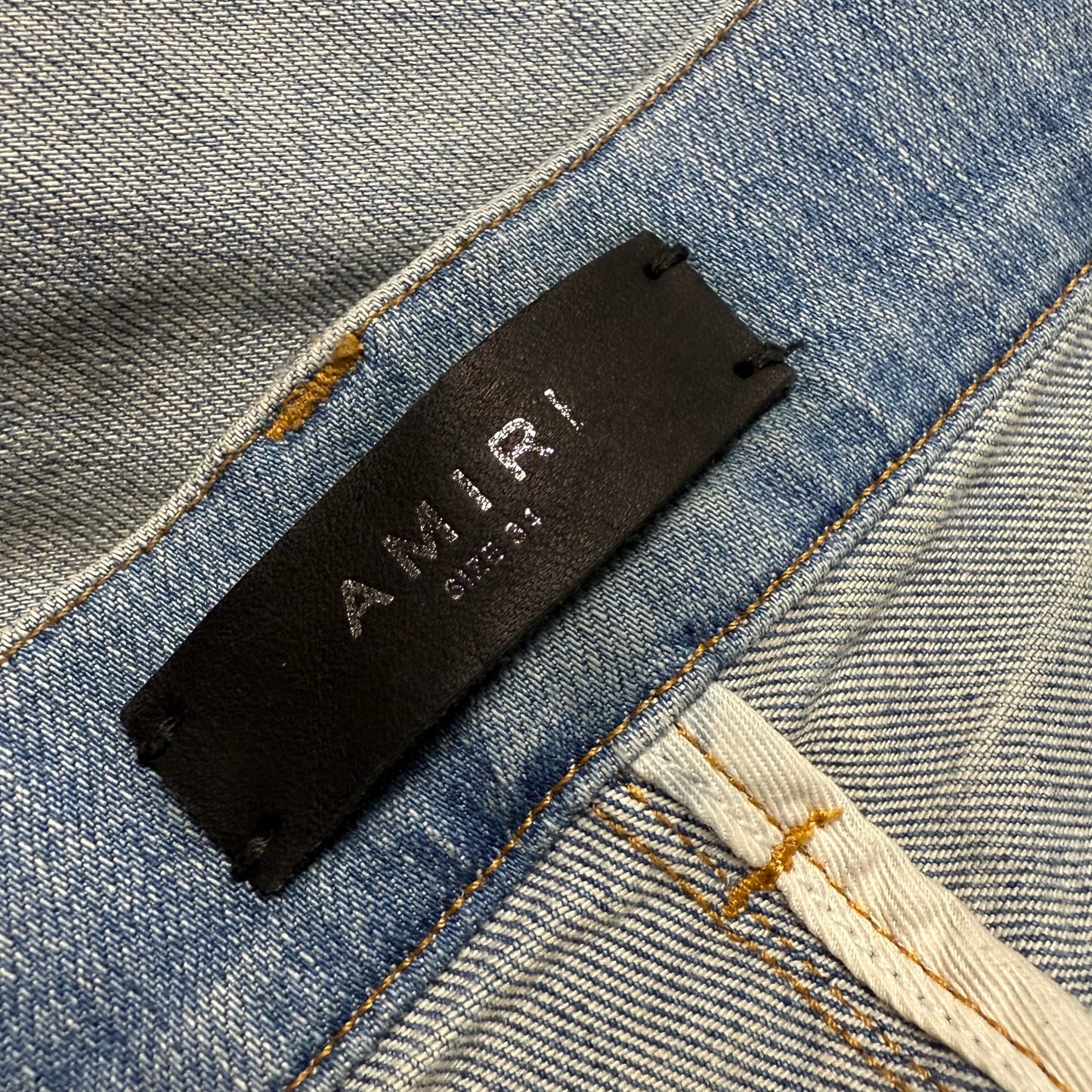 AMIRI Paint Drip Logo Skinny Jeans Light Indigo
