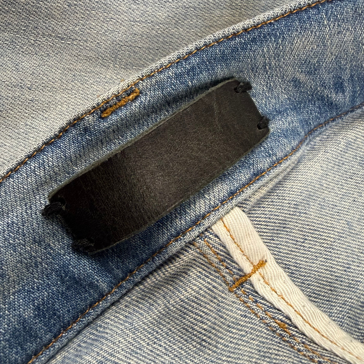 Amiri Old English Logo ‘Clay/Indigo’ Jeans