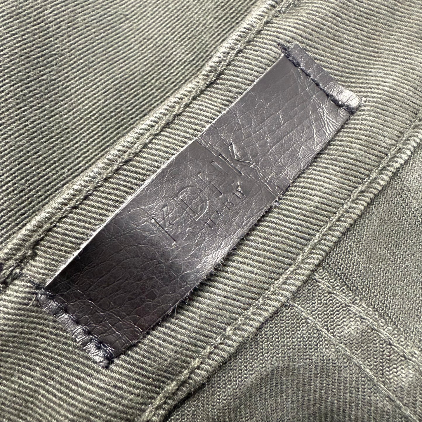 KDNK Distressed Flared ‘Green’ Jeans